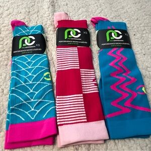 Pro Compression Performance Socks size XS. Get all 3 new with tags for $50.